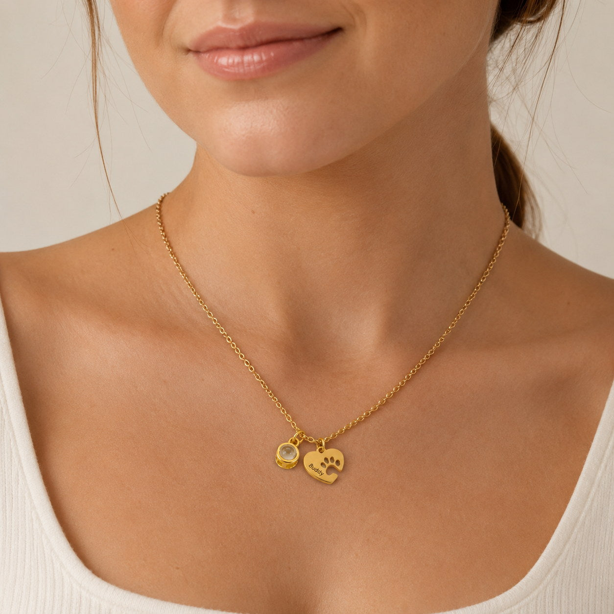 Gold Paw Heart Birthstone Necklace worn on model