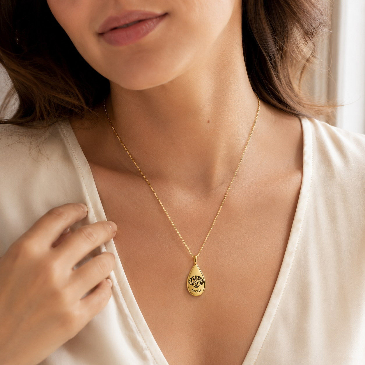 Gold Teardrop Memorial Urn Necklace worn on model